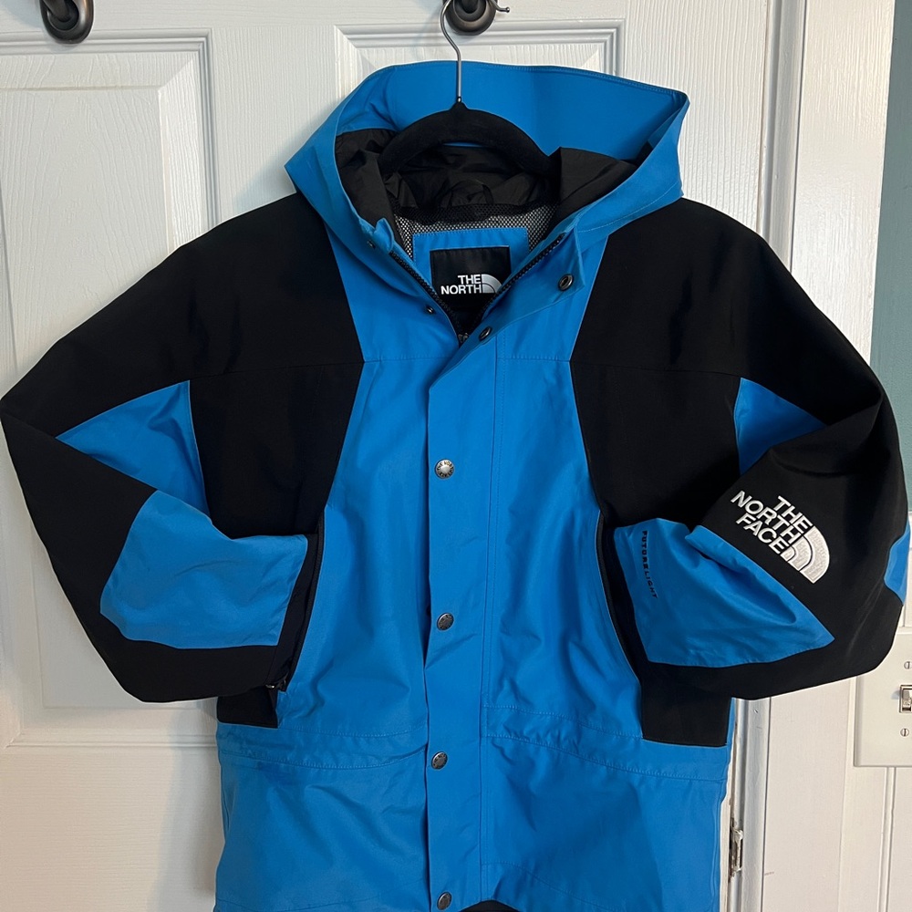 The North Face Kids Two-Tone Blue and Black Raincoat